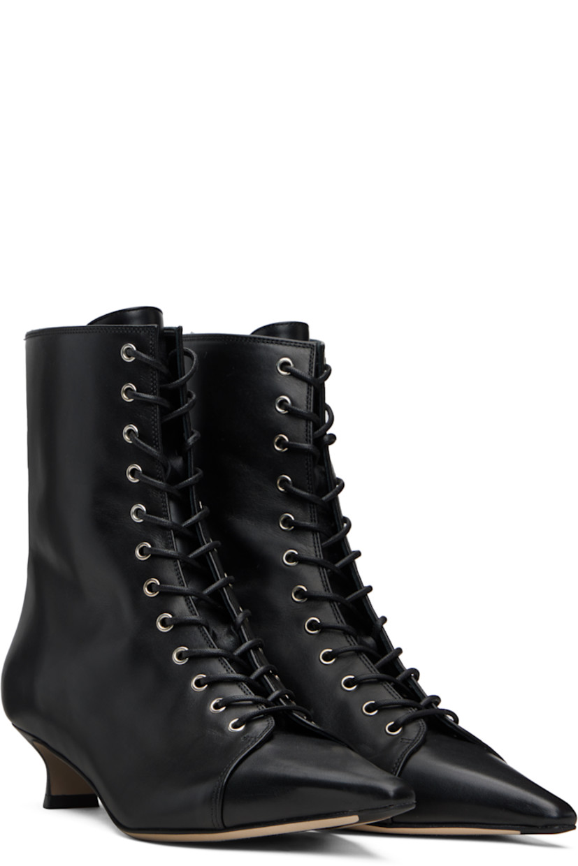 Ankle-high buffed calfskin boots. 

· Pointed toe 
· Lace-up closure at vamp
· Zip closure at back
· Red stitch at heel tab
· Stacked leather kitten heel 
· Nubuck sole with rubber injections 
· Heel: H1.5"

Supplier color: Black