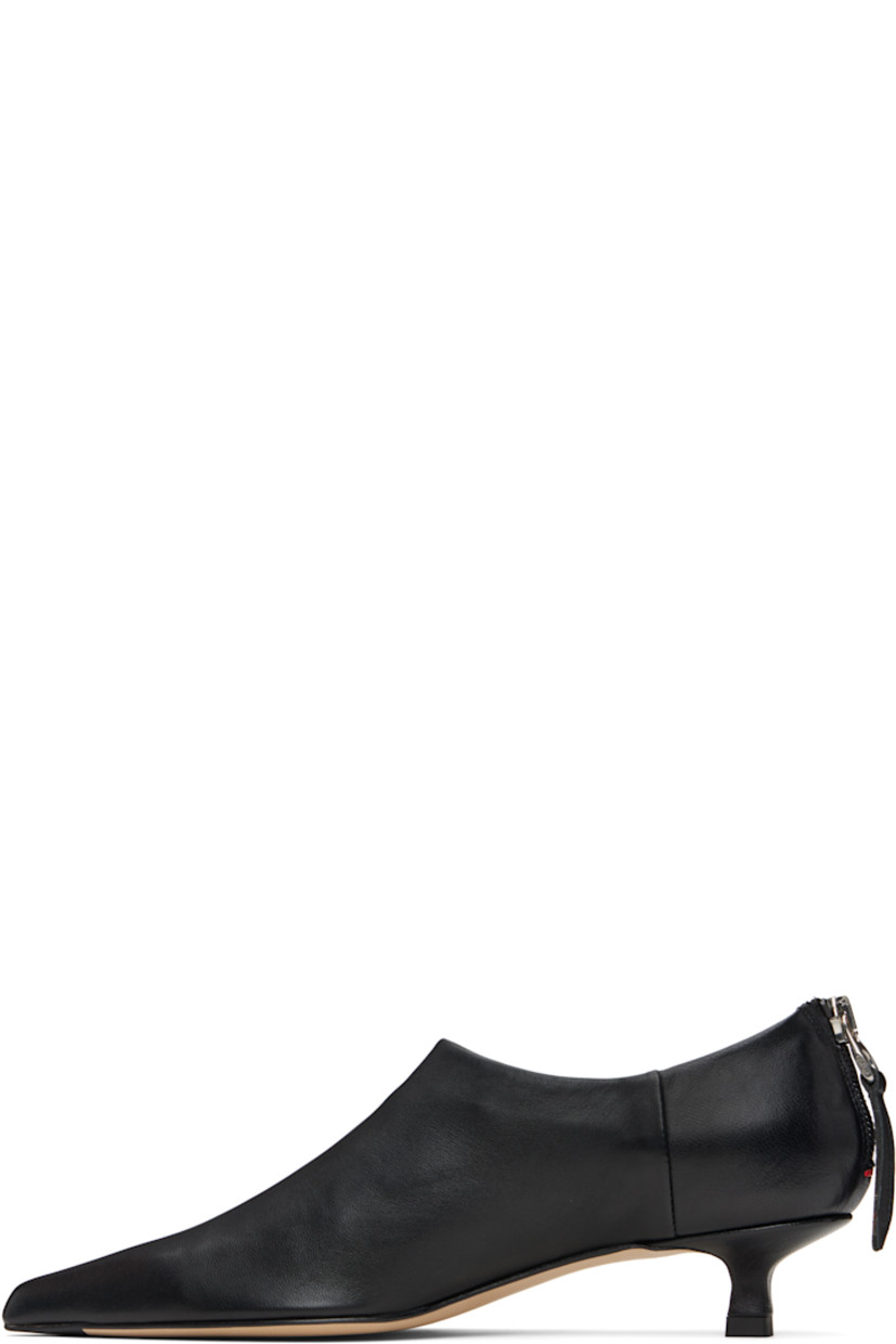 Buffed nappa leather heels.

· Pointed toe 
· Zip closure at back
· Red stitch at heel tab
· Lambskin lining 
· Covered kitten heel
· Nubuck sole with rubber injections
· Heel: H1.5"

Supplier color: Black