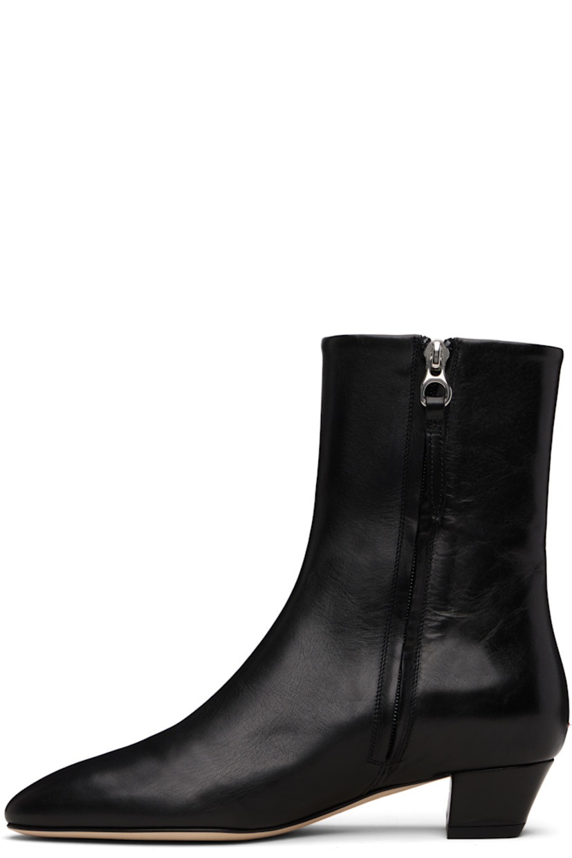 Ankle-high buffed calfskin boots.

· Almond toe
· Zip closure at inner side
· Red stitch at heel
· Buffed leather lining
· Covered block heel with rubber injection
· Leather sole
· Heel: H1.25"

Supplier color: Black