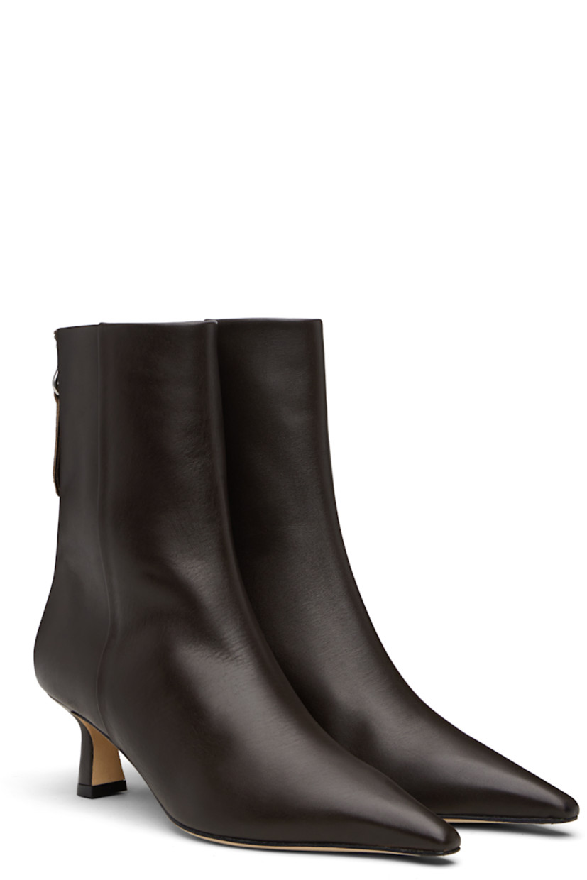 Ankle-high buffed calfskin boots.

· Pointed toe
· Zip closure and red stitch at heel
· Buffed leather lining
· Covered kitten heel
· Leather sole with rubber injections
· Heel: H2"

Supplier color: Moka