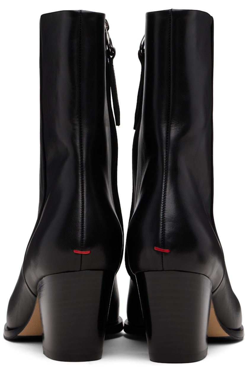 Ankle-high buffed calfskin boots.

· Pointed square toe
· Zip closure at inner side
· Red stitch at heel
· Buffed leather lining
· Stacked leather block heel
· Leather sole with rubber injections
· Heel: H2.5"

Supplier color: Black