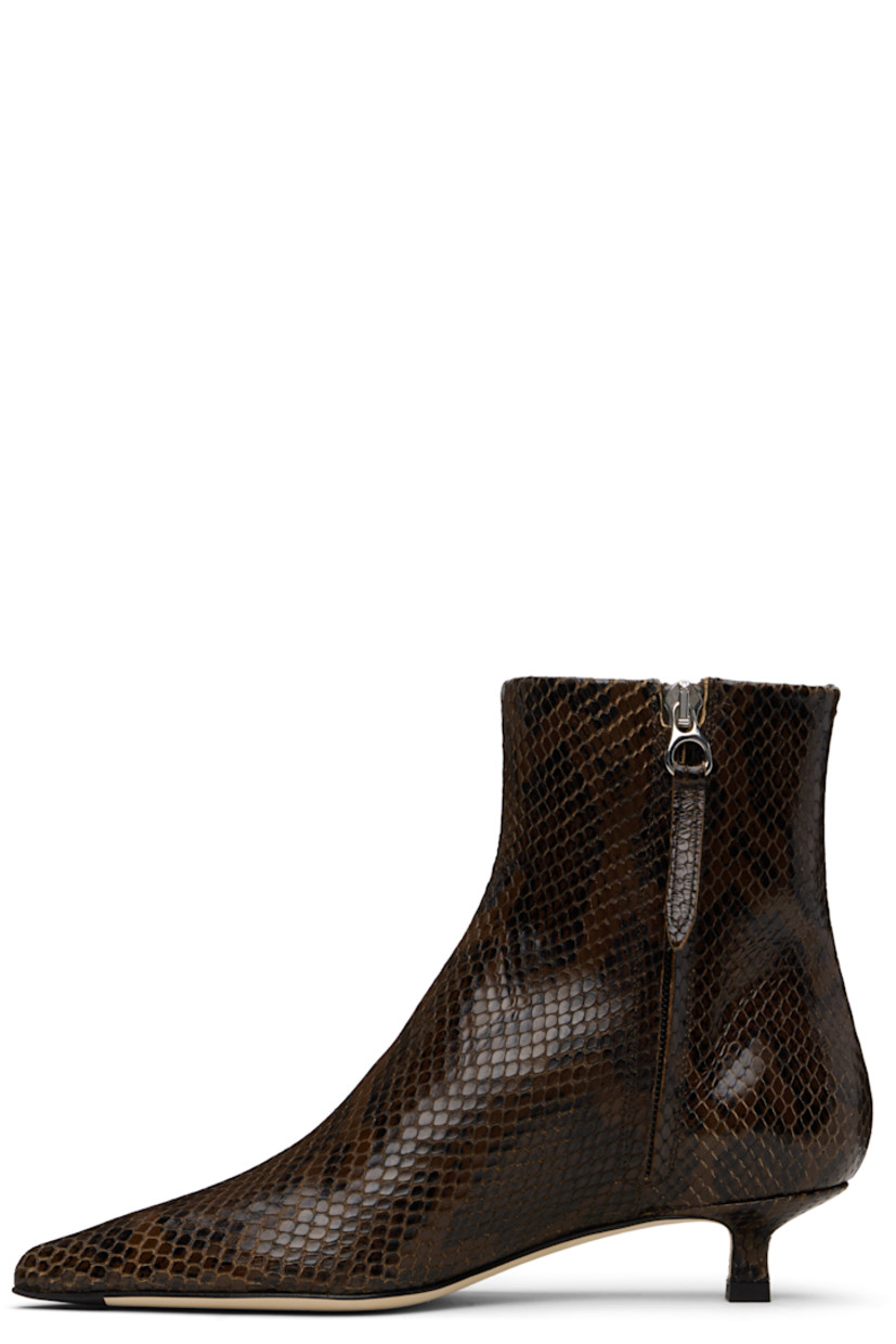 Ankle-high snake-embossed calfskin boots.

· Pointed toe
· Zip closure at inner side
· Red stitch at heel collar
· Buffed lambskin lining
· Covered kitten heel
· Leather sole with rubber injections
· Heel: H1"

Supplier color: Moka