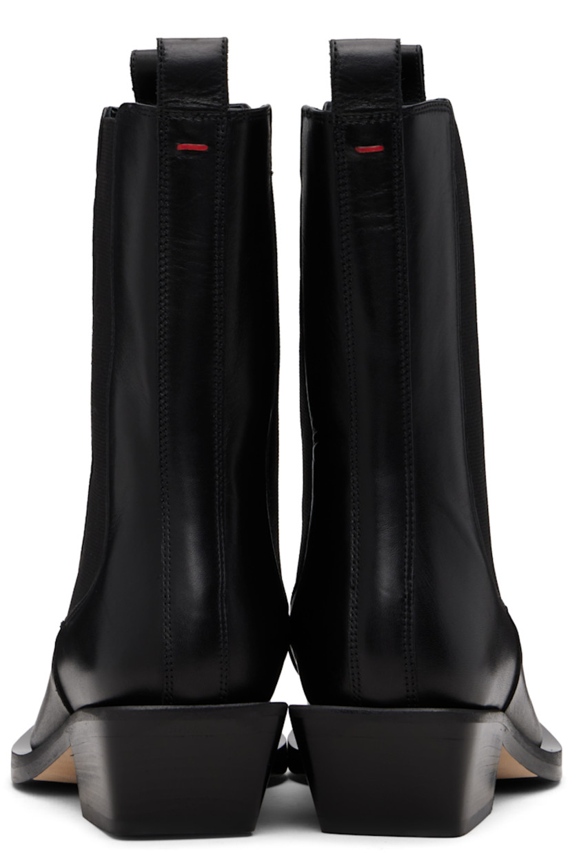 Ankle-high buffed calfskin Chelsea boots.

· Square toe
· Pull-loops at collar
· Elasticized gusset at sides
· Red stitch at heel collar
· Buffed leather lining
· Stacked leather block heel
· Smooth rubber sole
· Heel: H1.75"

Supplier color: Black