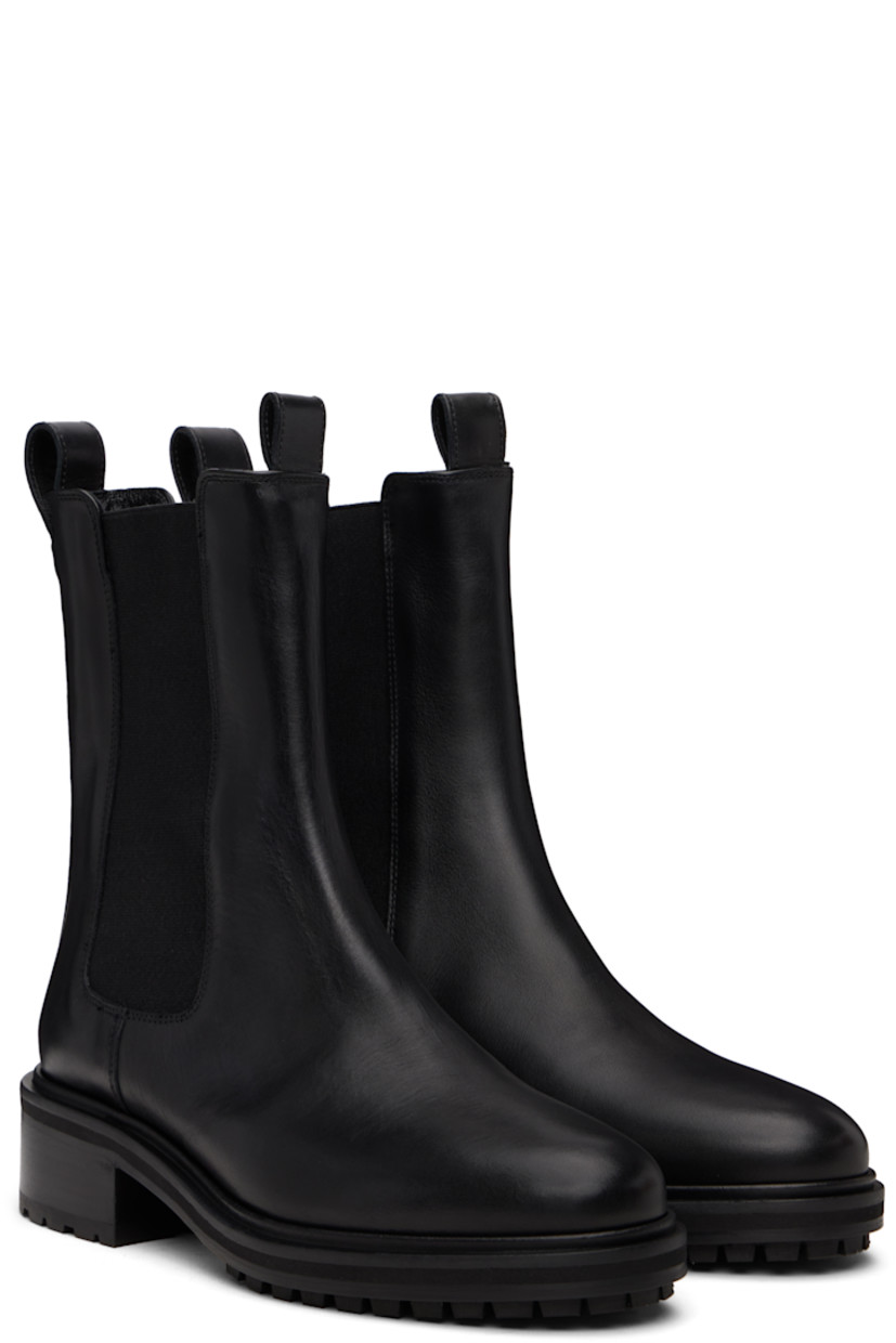 Ankle-high buffed calfskin Chelsea boots.

· Pull-loops at collar
· Elasticized gusset at sides
· Red stitch at heel collar
· Buffed lambskin lining
· Stacked leather and rubber midsole and block heel
· Treaded rubber sole
· Heel: H1"

Supplier color: Black calf
