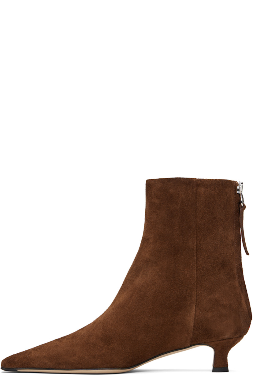 Ankle-high suede boots.

· Pointed toe
· Zip closure at back
· Red stitch at heel counter
· Lambskin lining
· Covered kitten heel 
· Nubuck sole with rubber injections
· Heel: H1.5"

Supplier color: Brown