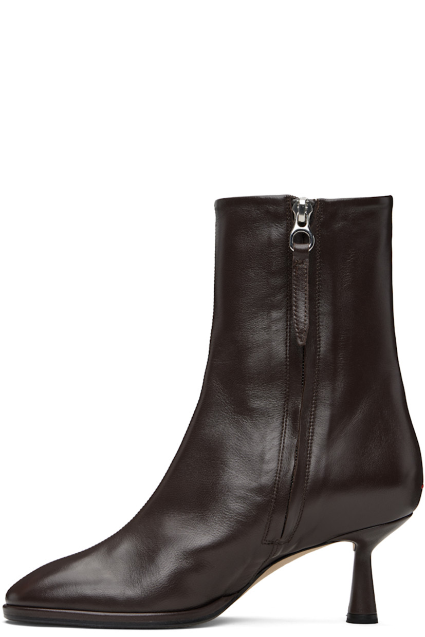Ankle-high buffed nappa leather boots.

· Zip closure at inner side
· Lambskin lining 
· Red stitch at heel counter
· Covered spool heel 
· Nubuck sole with rubber injections
· Heel: H2.5"

Supplier color: Moka nappa