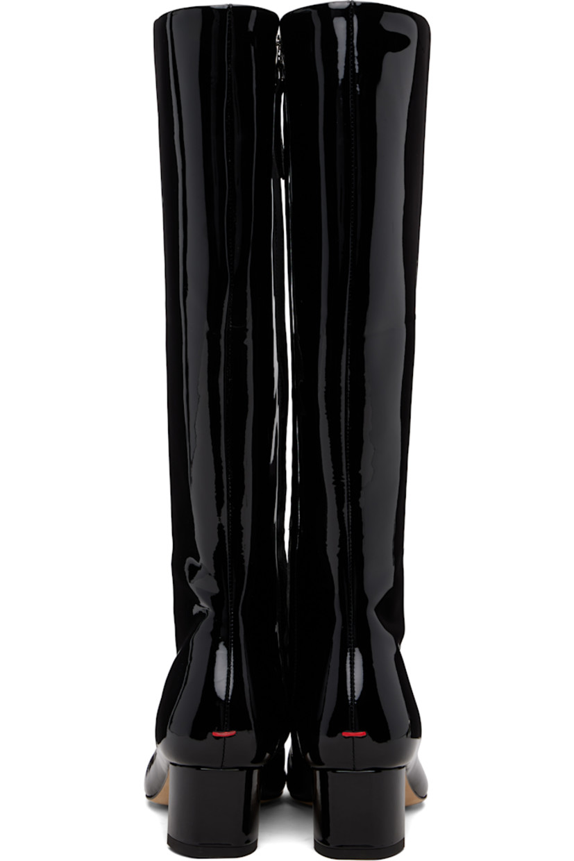 Knee-high patent calfskin boots.

· Square toe
· Central seam at vamp
· Zip closure at inner side
· Red stitch at heel
· Buffed leather lining
· Block heel with rubber injection
· Leather sole
· Heel: H1.75"

Supplier color: Black