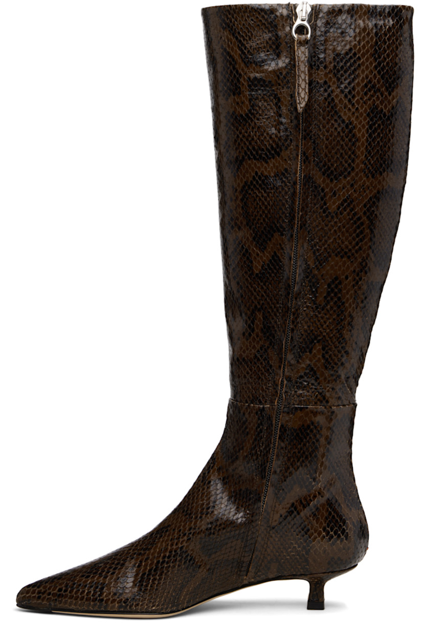 Knee-high snake-embossed calfskin boots.

· Paneled construction
· Pointed toe
· Zip closure at inner side
· Red stitch at heel
· Buffed leather lining
· Kitten heel
· Leather sole with rubber injections
· Heel: H1.25"

Supplier color: Moka