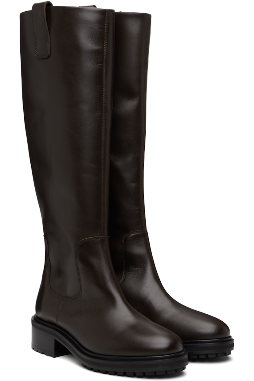 Knee-high buffed calfskin boots.

· Pull-loops at collar
· Red stitch at heel counter
· Buffed lambskin lining
· Stacked leather and rubber midsole and block heel
· Treaded rubber sole
· Heel: H1.5"

Supplier color: Moka
