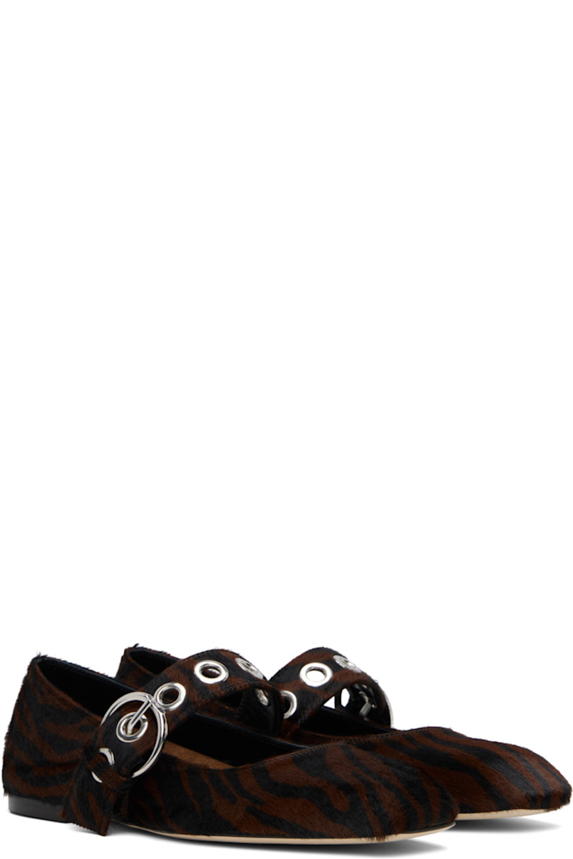 Calf-hair Mary Jane-style ballerina flats in black and brown.

· Graphic pattern printed throughout
· Square toe
· Pin-buckle strap with eyelets at vamp
· Red stitch at heel collar
· Buffed lambskin lining
· Rubber heel
· Leather sole

Supplier color: Moka ponyhair