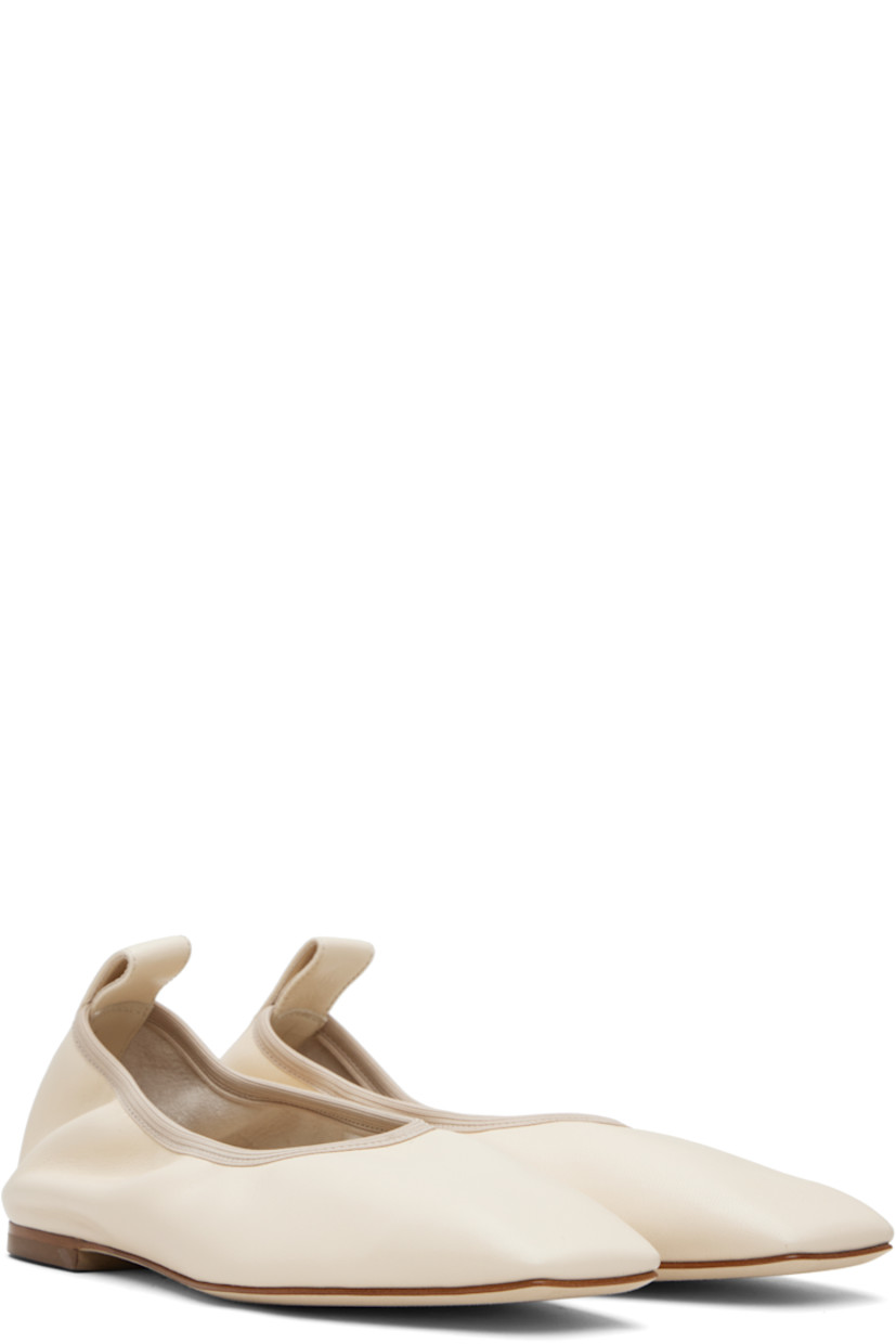 Buffed nappa leather ballerina flats. 

· Square toe 
· Elasticized collar 
· Pull-loop and red stitch at heel tab 
· Rubber heel
· Nubuck sole 

Supplier color: Creamy nappa