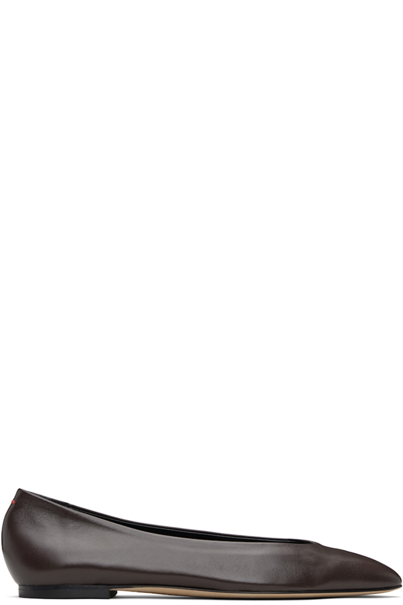 Grained nappa leather ballerina flats.

· Pointed toe
· Red stitch at heel tab
· Lambskin lining 
· Rubber heel
· Nubuck sole

Supplier color: Moka nappa
