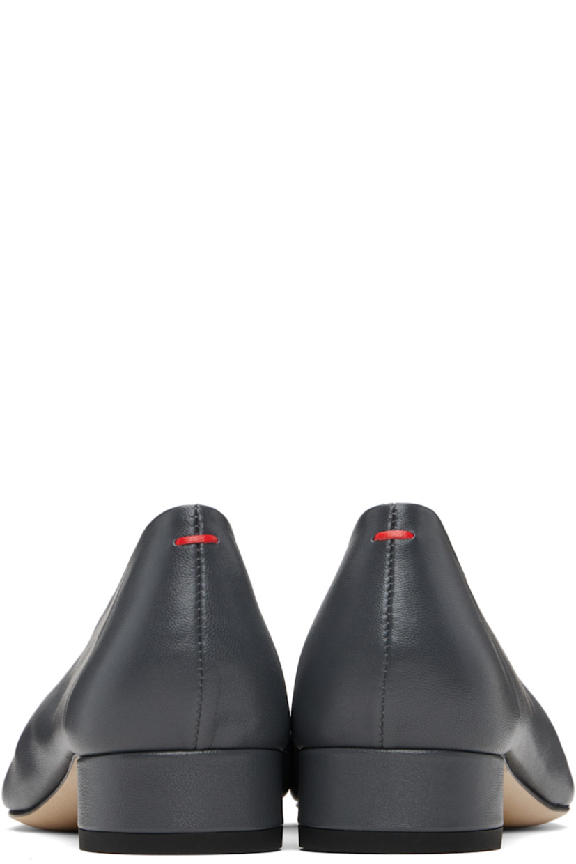 Grained nappa leather ballerina-style heels.

· Square toe 
· Red stitch at heel tab
· Covered block heel with rubber injection
· Nubuck sole 
· Heel: H1.25"

Supplier color: Charcoal nappa
