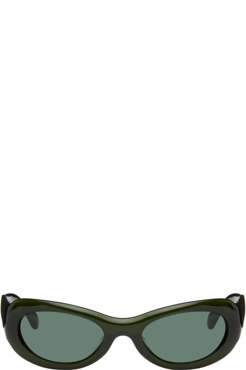 Handcrafted oval cat-eye semi-transparent acetate-frame sunglasses in green. 

· Green lenses
· 100% UVA/UVB protection 
· Integrated nose pads
· Rivets at temples
· Exposed core wires 
· Includes pouch
· Size: 53.21 135

Part of the exclusive SSENSE HEAT capsule.

Supplier color: Green/Green