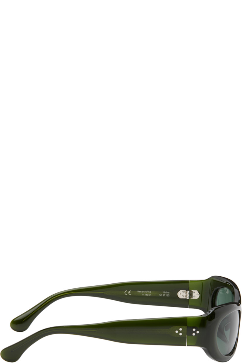 Handcrafted oval cat-eye semi-transparent acetate-frame sunglasses in green. 

· Green lenses
· 100% UVA/UVB protection 
· Integrated nose pads
· Rivets at temples
· Exposed core wires 
· Includes pouch
· Size: 53.21 135

Part of the exclusive SSENSE HEAT capsule.

Supplier color: Green/Green