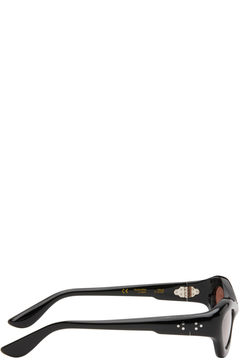 Handcrafted cat-eye cellulose acetate-frame sunglasses.

· Orange lenses
· 100% UVA/UVB protection
· Integrated nose pads
· Signature rivets at temples
· Includes pouch
· Size: 57.20 137

Part of the Bast collection.

Supplier color: Black/Tobacco