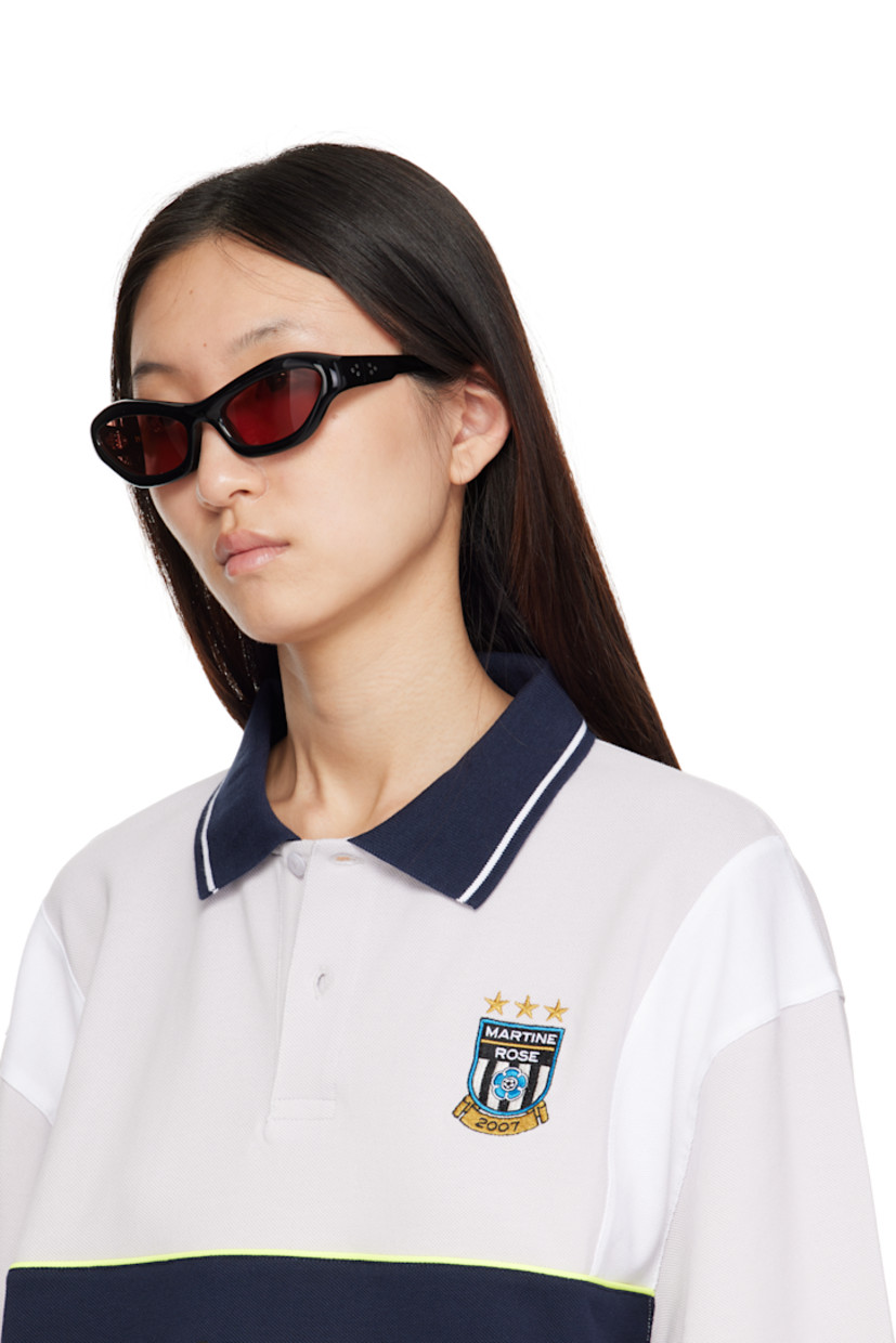 Handcrafted cat-eye cellulose acetate-frame sunglasses.

· Orange lenses
· 100% UVA/UVB protection
· Integrated nose pads
· Signature rivets at temples
· Includes pouch
· Size: 57.20 137

Part of the Bast collection.

Supplier color: Black/Tobacco