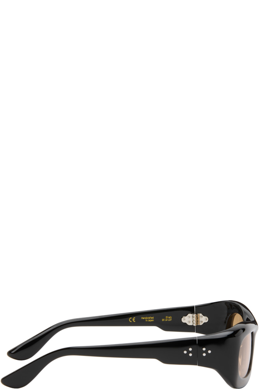 Handcrafted rectangular cellulose acetate-frame sunglasses.

· Brown lenses
· 100% UVA/UVB protection
· Integrated nose pads
· Signature rivets at temples
· Includes pouch
· Size: 56.19 137

Part of the Bast collection.

Supplier color: Black/Amber
