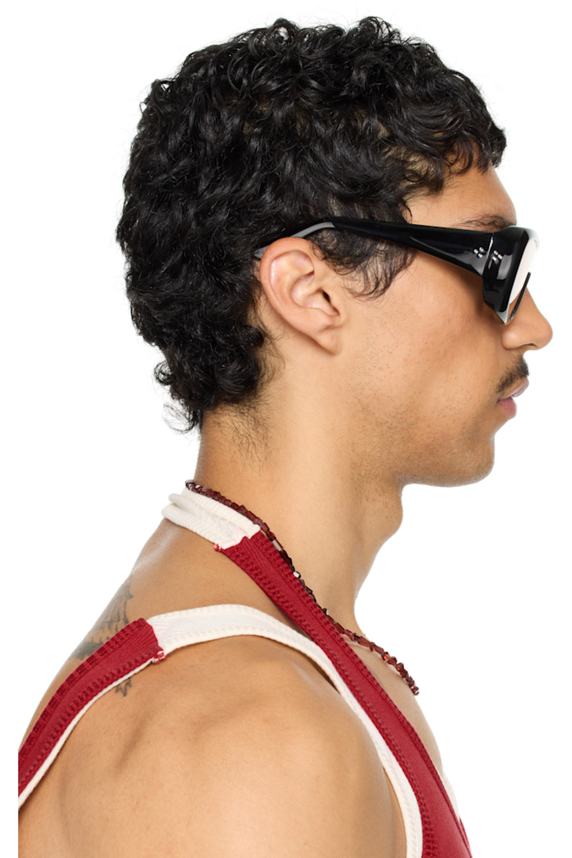 Handcrafted aviator-style acetate-frame sunglasses in black. 

· Orange lens
· 100% UVA/UVB protection 
· Integrated nose pads
· Rivets at temples
· Includes pouch
· Size: 52.22 135

Part of the exclusive SSENSE HEAT capsule.

Supplier color: Black/Yellow