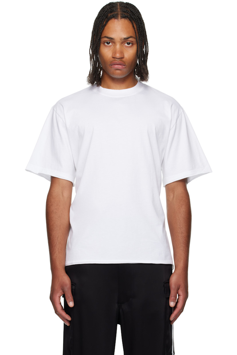 Cotton jersey T-shirt.

· Rib-knit crewneck
· Rolled edge at hems and cuffs
· Embroidered logo at back collar
· Open back with self-tie fastening

Supplier color: White