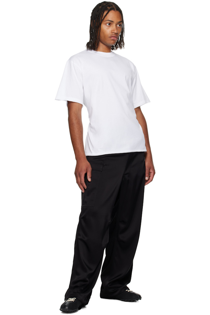 Cotton jersey T-shirt.

· Rib-knit crewneck
· Rolled edge at hems and cuffs
· Embroidered logo at back collar
· Open back with self-tie fastening

Supplier color: White