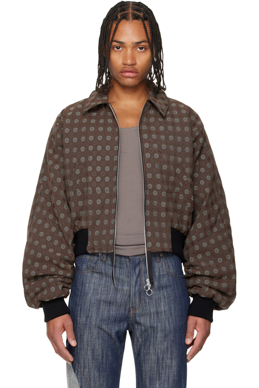 Insulated stretch twill bomber jacket.

· Jacquard floral pattern throughout
· Spread collar
· Two-way zip closure
· Welt pockets at front
· Rib-knit hem and cuffs
· Locker loop at back collar
· Flap pockets at back
· Full quilted satin lining

Supplier color: Brown