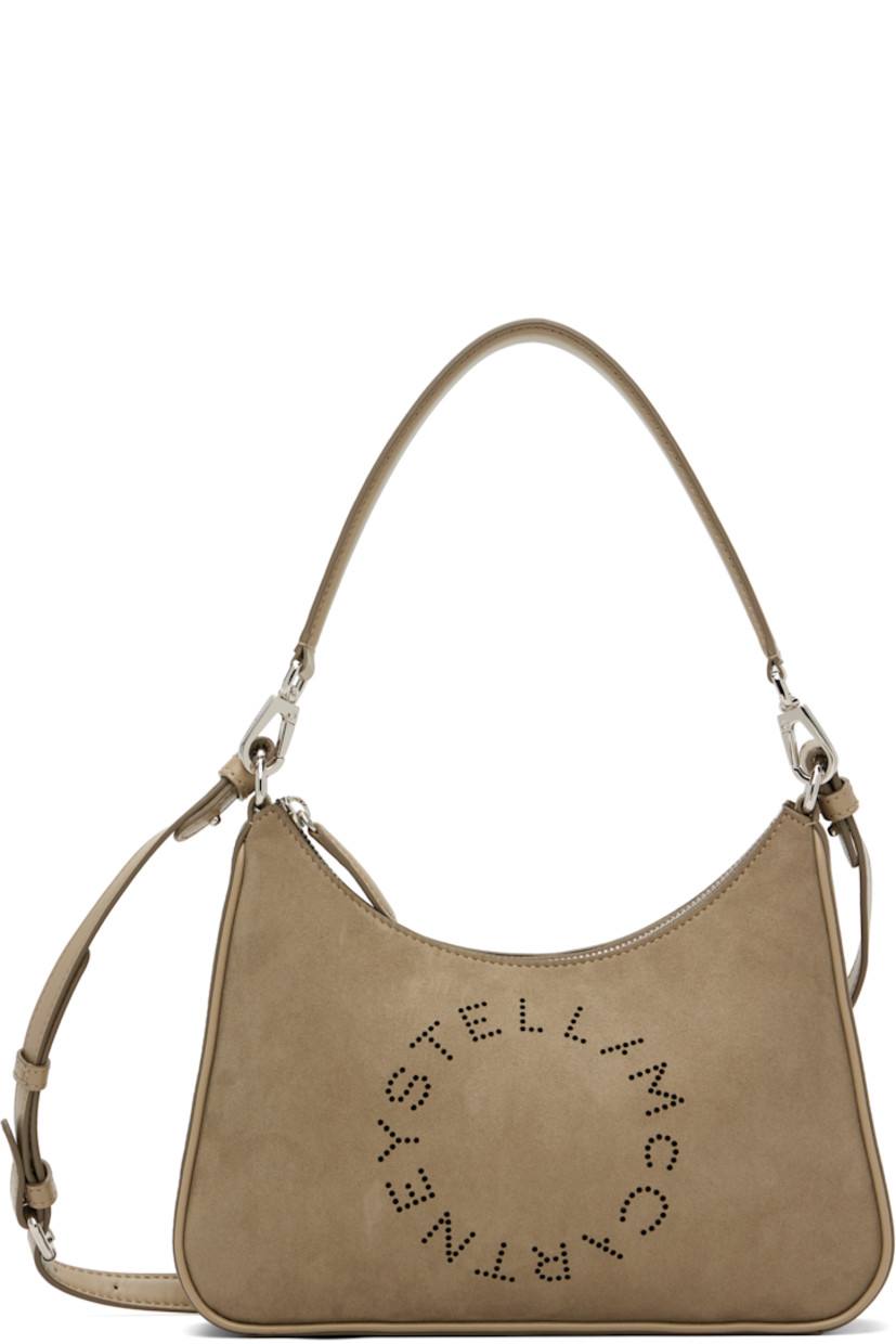 Faux-suede shoulder bag.

· Buffed faux-leather trim throughout
· Detachable carry handle
· Adjustable and detachable shoulder strap
· Perforated logo at face
· Zip closure
· Zip pocket at interior
· Buffed faux-leather lining
· H9.5" x W7" x D2.5"

Made from cruelty-free, non-animal materials.

Supplier color: Khaki