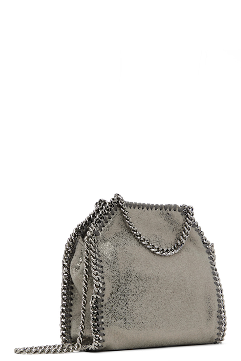 Grained faux-leather shoulder bag in silver tone.

· GOTS-certified organic cotton whipstitching
· Curb chain trim throughout
· Fixed carry handles
· Logo charm at handle
· Fixed crossbody strap
· Magnetic press-stud closure
· Patch pocket at interior
· Logo-woven twill lining
· H7.5" x W6.5" x D3"

Made from cruelty-free, non-animal materials.

Supplier color: Grey