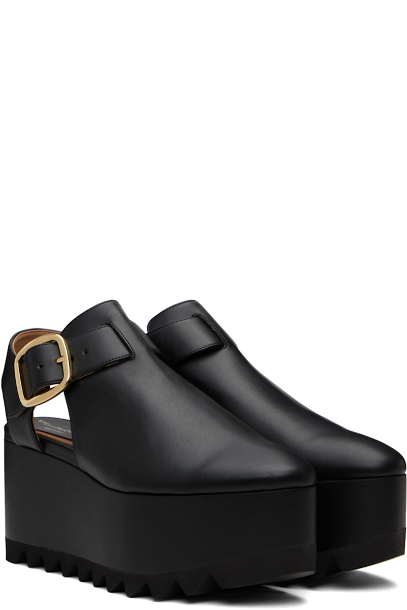 Buffed faux-leather sandals.

· Almond toe
· Pin-buckle ankle strap
· Faux-leather-covered platform midsole
· Treaded rubber sole 
· Logo-engraved gold-tone hardware 
· Platform: H2.5" 
· Heel: H3.5"

Made from cruelty-free, non-animal materials.

Supplier color: Black