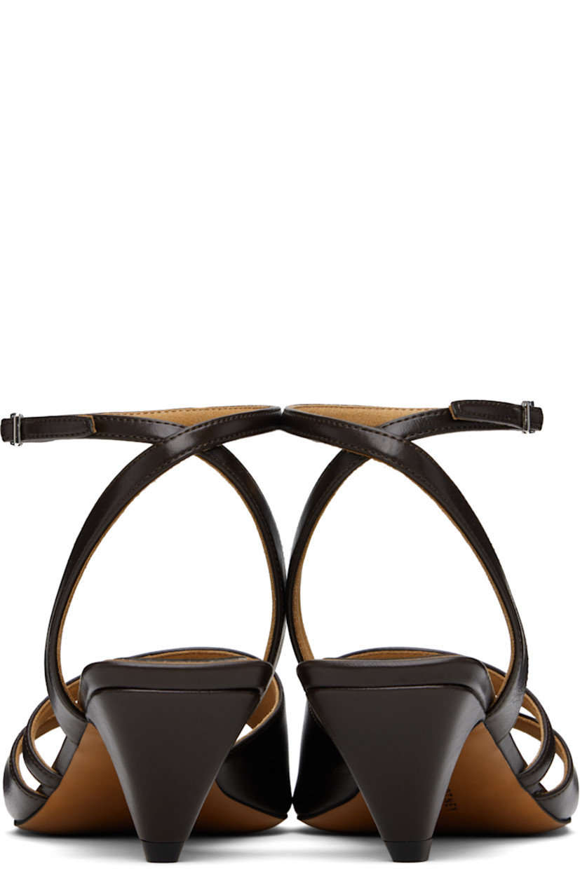 Buffed faux-leather heeled sandals in brown.

· Open square toe
· Thong-style strap at vamp
· Pin-buckle ankle strap
· Logo patch at padded footbed
· Covered kitten heel with rubber injection
· Faux-leather sole
· Heel: H2"

Made from cruelty-free, non-animal materials.

Supplier color: Chocolate brown