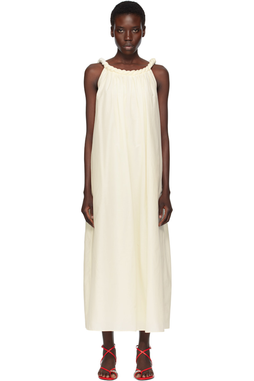 Cotton- and silk-blend voile maxi dress. 

· Certified OEKO-TEX® Standard 100
· Boat neck
· Gathering at chest and back
· Fixed braided shoulder straps 
· Seam pockets
· Low back
· Full plain-woven cotton lining

Supplier color: Ivory