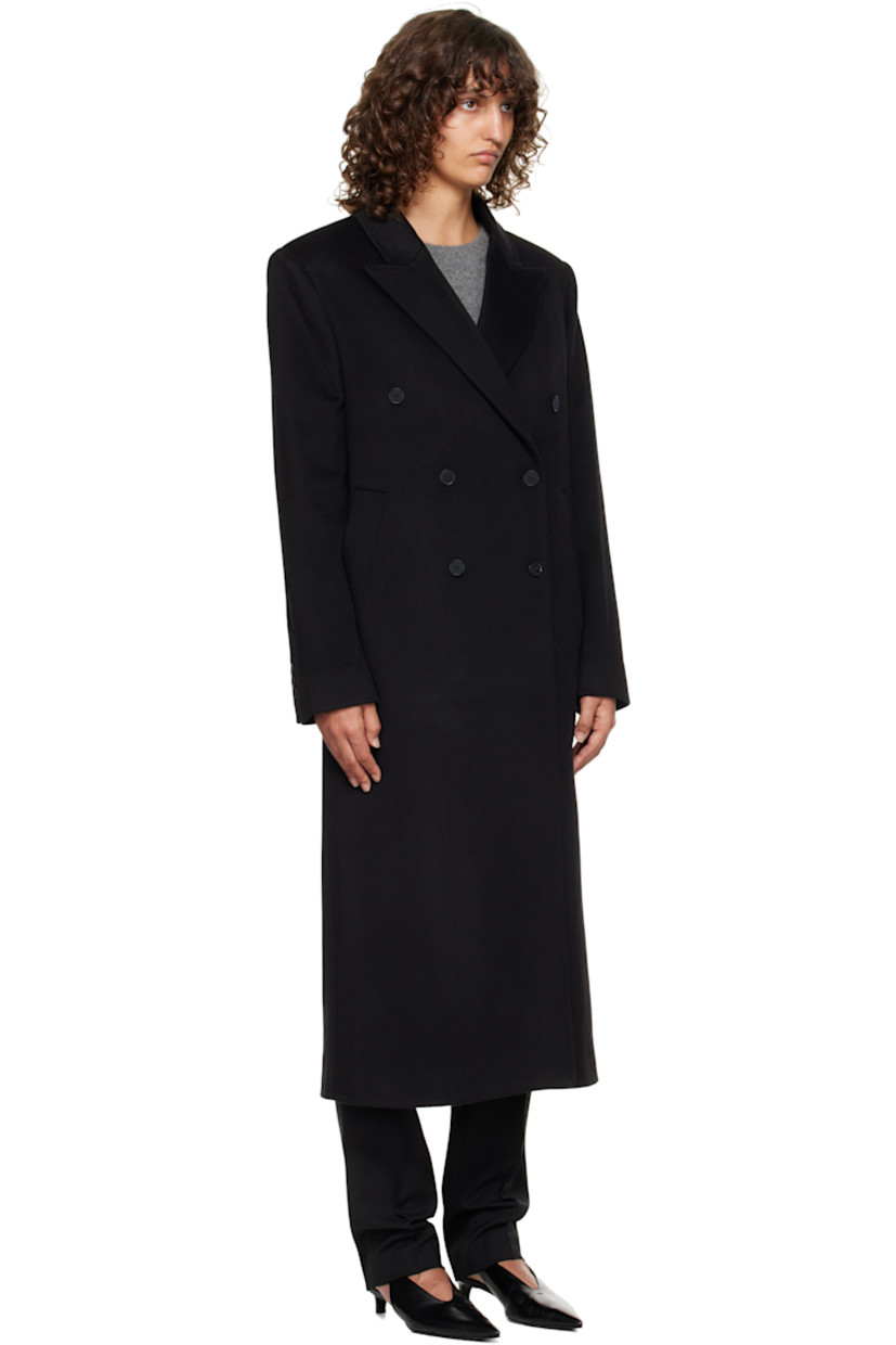 Wool- and cashmere-blend melton coat.

· OEKO-TEX® STANDARD 100-certified
· Peaked lapel
· Double-breasted button closure
· Welt pockets at waist
· Padded shoulders
· Surgeon's cuffs 
· Central vent at back hem
· Welt pocket at interior
· Full satin lining

Supplier color: Black