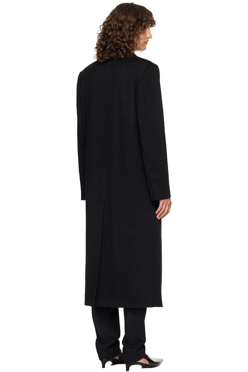 Wool- and cashmere-blend melton coat.

· OEKO-TEX® STANDARD 100-certified
· Peaked lapel
· Double-breasted button closure
· Welt pockets at waist
· Padded shoulders
· Surgeon's cuffs 
· Central vent at back hem
· Welt pocket at interior
· Full satin lining

Supplier color: Black