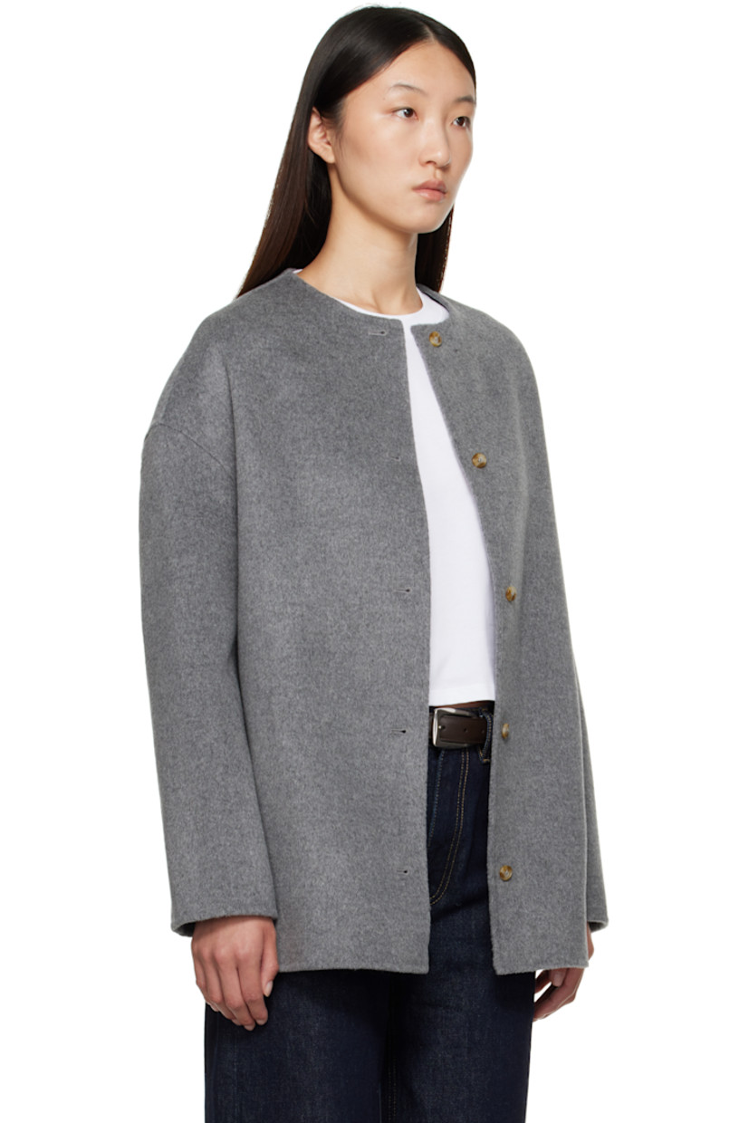 Wool- and cashmere-blend melton coat.

· RWS-certified
· Round neck
· Button closure
· Seam pockets
· Dropped shoulders
· Central seam at back

Supplier color: Grey melange