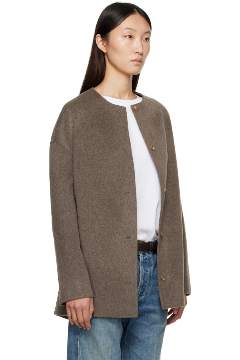Wool- and cashmere-blend melton coat.

· RWS-certified
· Round neck
· Button closure
· Seam pockets
· Dropped shoulders
· Central seam at back

Supplier color: Taupe melange