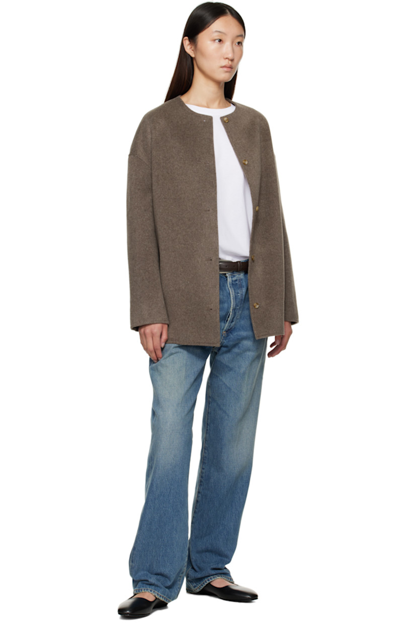 Wool- and cashmere-blend melton coat.

· RWS-certified
· Round neck
· Button closure
· Seam pockets
· Dropped shoulders
· Central seam at back

Supplier color: Taupe melange
