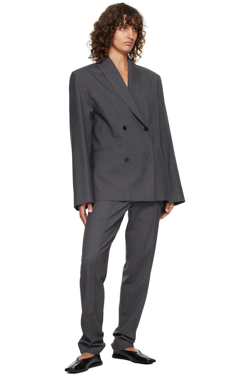 Stretch virgin wool twill trousers.

· OEKO-TEX® STANDARD 100-certified
· Tapered
· Mid-rise
· Belt loops
· Two-pocket styling
· Zip fly
· Pinched seam at legs

Supplier color: Anthracite melange