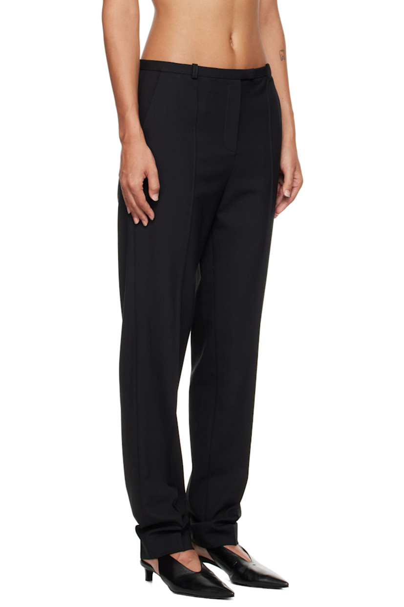 Stretch virgin wool twill trousers.

· OEKO-TEX® STANDARD 100-certified
· Tapered
· Mid-rise
· Belt loops
· Two-pocket styling
· Zip fly
· Pinched seam at legs

Supplier color: Black