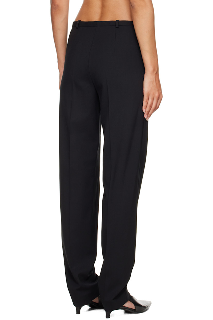 Stretch virgin wool twill trousers.

· OEKO-TEX® STANDARD 100-certified
· Tapered
· Mid-rise
· Belt loops
· Two-pocket styling
· Zip fly
· Pinched seam at legs

Supplier color: Black