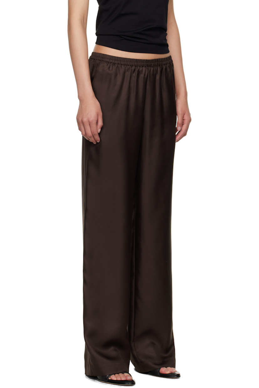 Silk twill trousers.

· OEKO-TEX® STANDARD 100-certified
· Loose-fit
· Mid-rise
· Elasticized waistband
· Three-pocket styling

Supplier color: Deep Brown