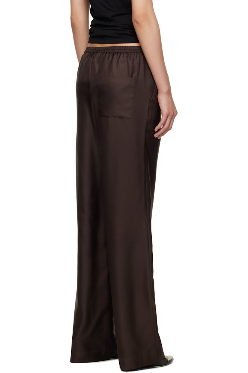 Silk twill trousers.

· OEKO-TEX® STANDARD 100-certified
· Loose-fit
· Mid-rise
· Elasticized waistband
· Three-pocket styling

Supplier color: Deep Brown