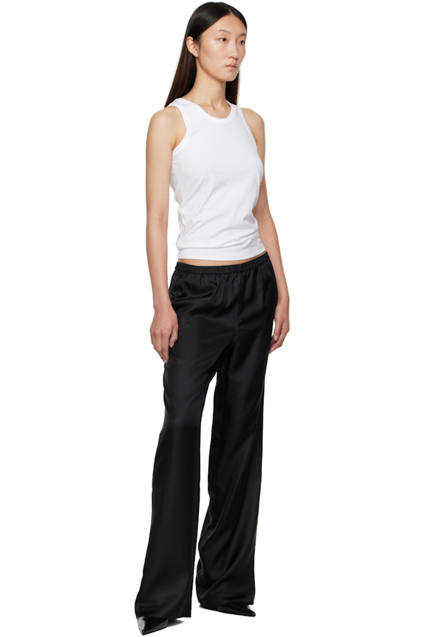 Silk twill trousers.

· OEKO-TEX® STANDARD 100-certified
· Loose-fit
· Mid-rise
· Elasticized waistband
· Three-pocket styling

Supplier color: Black