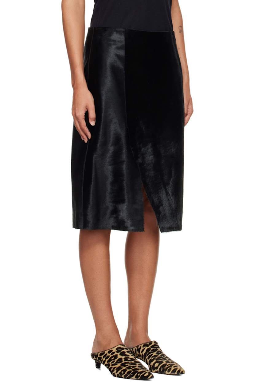 Calf-hair midi skirt.

· Mid-rise
· Offset vent at front
· Concealed zip closure at back
· Full satin lining

Supplier color: Black