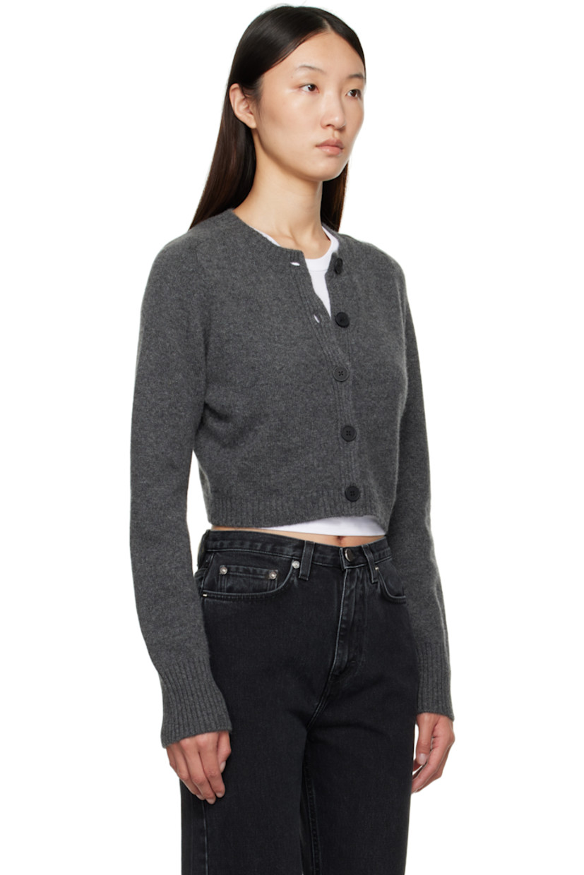 Knit cashmere cardigan.

· OEKO-TEX® STANDARD 100-certified
· Rib-knit crewneck, placket, hem, and cuffs
· Button closure
· Logo embroidered at front hem
· Cropped hem
· Saddle shoulders

Supplier color: Anthracite melange