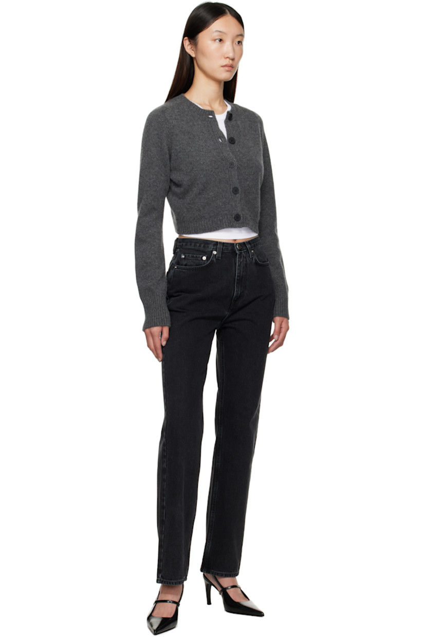 Knit cashmere cardigan.

· OEKO-TEX® STANDARD 100-certified
· Rib-knit crewneck, placket, hem, and cuffs
· Button closure
· Logo embroidered at front hem
· Cropped hem
· Saddle shoulders

Supplier color: Anthracite melange