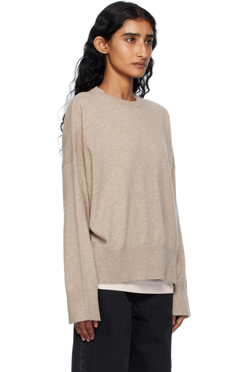 Knit cashmere sweater. 

· Certified OEKO-TEX® Standard 100
· Rib-knit crewneck, hem, and cuffs
· Dropped shoulders 

Supplier color: Beige melange