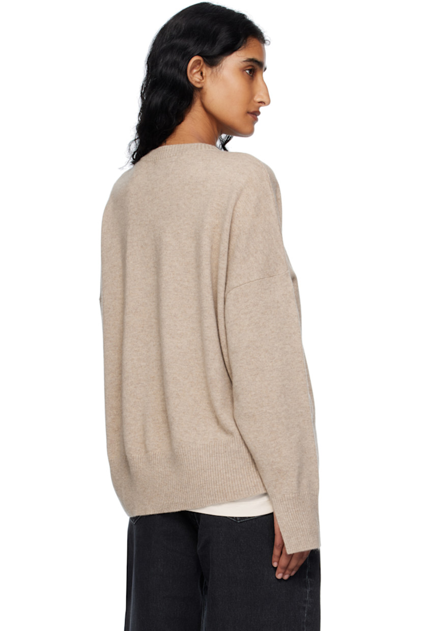 Knit cashmere sweater. 

· Certified OEKO-TEX® Standard 100
· Rib-knit crewneck, hem, and cuffs
· Dropped shoulders 

Supplier color: Beige melange