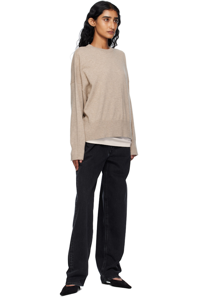 Knit cashmere sweater. 

· Certified OEKO-TEX® Standard 100
· Rib-knit crewneck, hem, and cuffs
· Dropped shoulders 

Supplier color: Beige melange