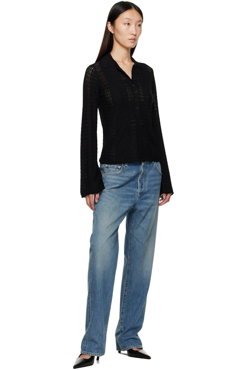 Pointelle-knit stretch wool- and cashmere-blend polo.

· OEKO-TEX® STANDARD 100-certified
· Semi-sheer
· Spread collar
· Seven-button placket
· Scalloped edge at hem and cuffs

Supplier color: Black