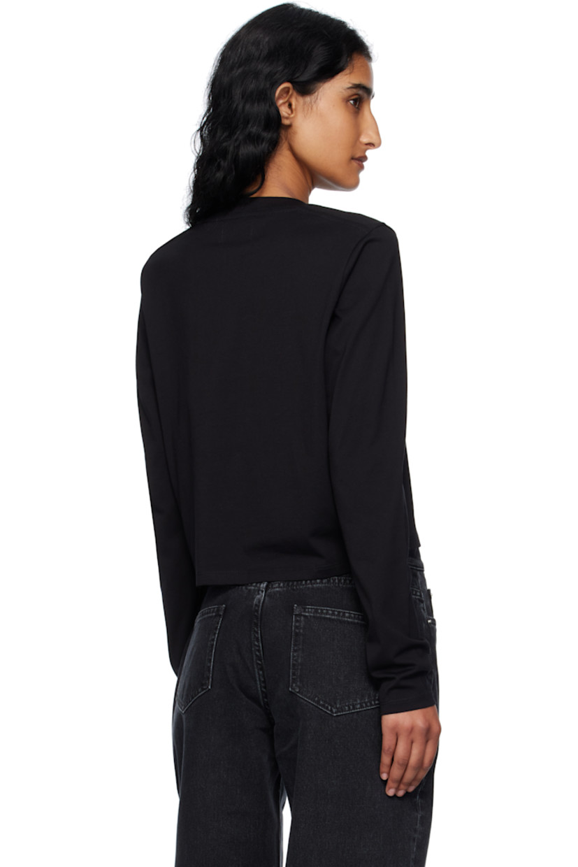 Organic Supima cotton jersey T-shirt.

· Certified GOTS organic cotton
· Rib-knit crewneck
· Logo embroidered at front hem
· Cropped hem

Supplier color: Black